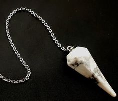 PENDULE HOWLITE FORME CÔNE